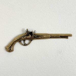 VINTAGE brass pistol wall hanging